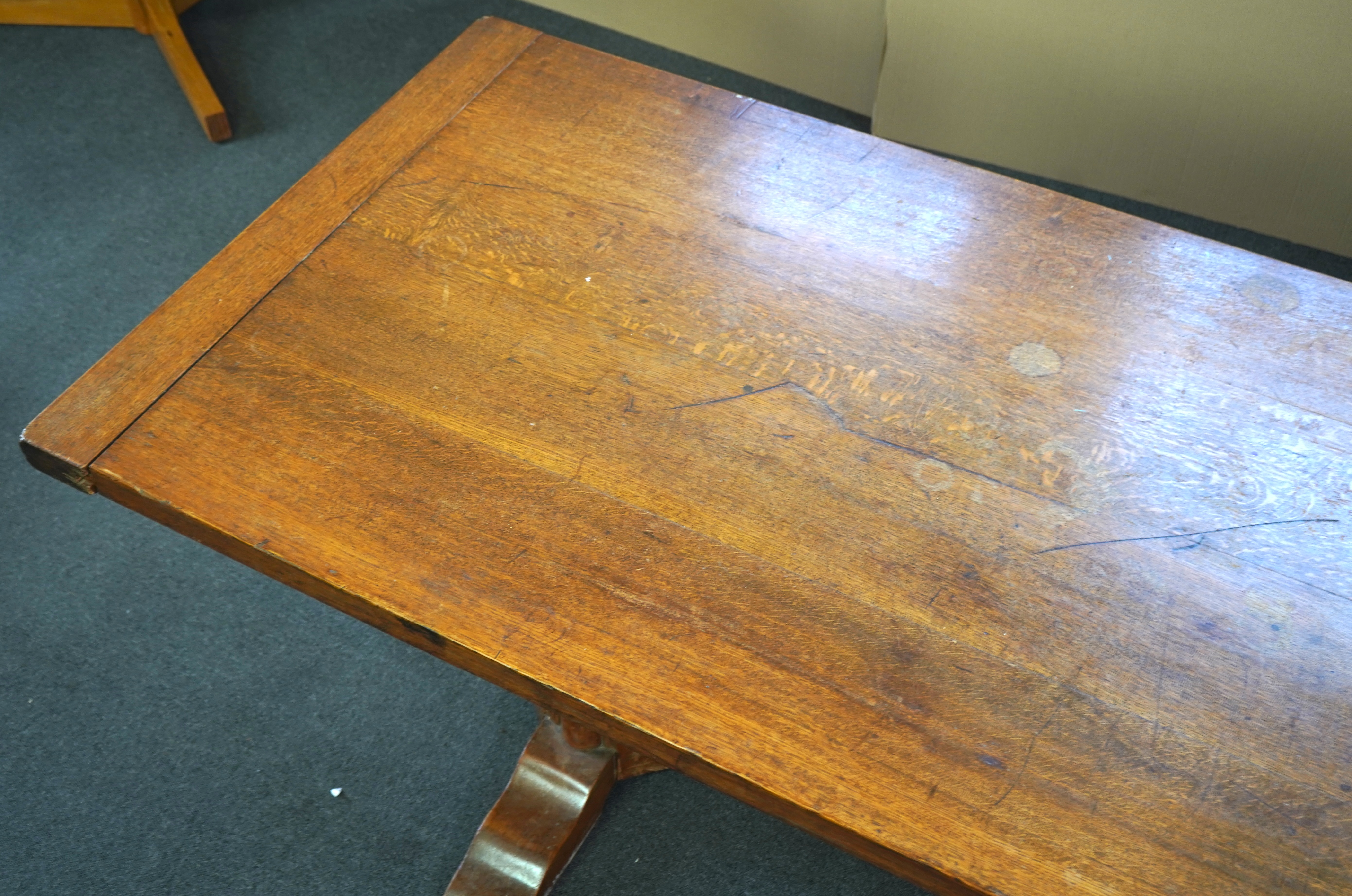 An Arts and Crafts oak refectory dining table